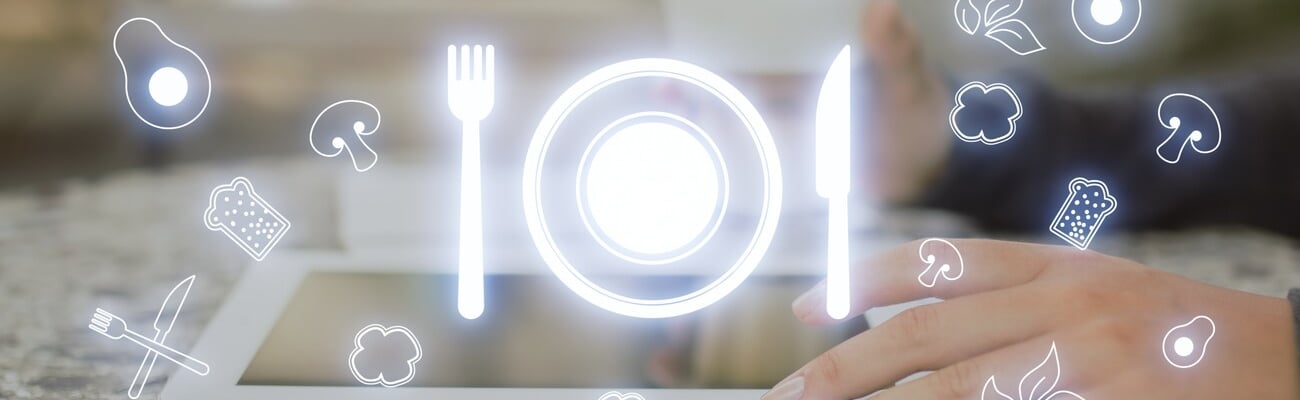 Futuristic restaurant menu application concept with glowing silverware hologram on blurry background. Side view of female hands using tablet at desktop on blurry background. Double exposure; Shutterstock ID 2268778489
